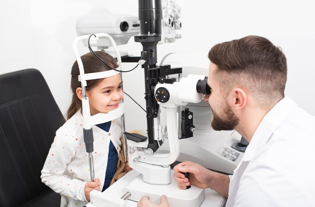A child having a comprehensive eye exam to detect for signs of myopia or astigmatism.
